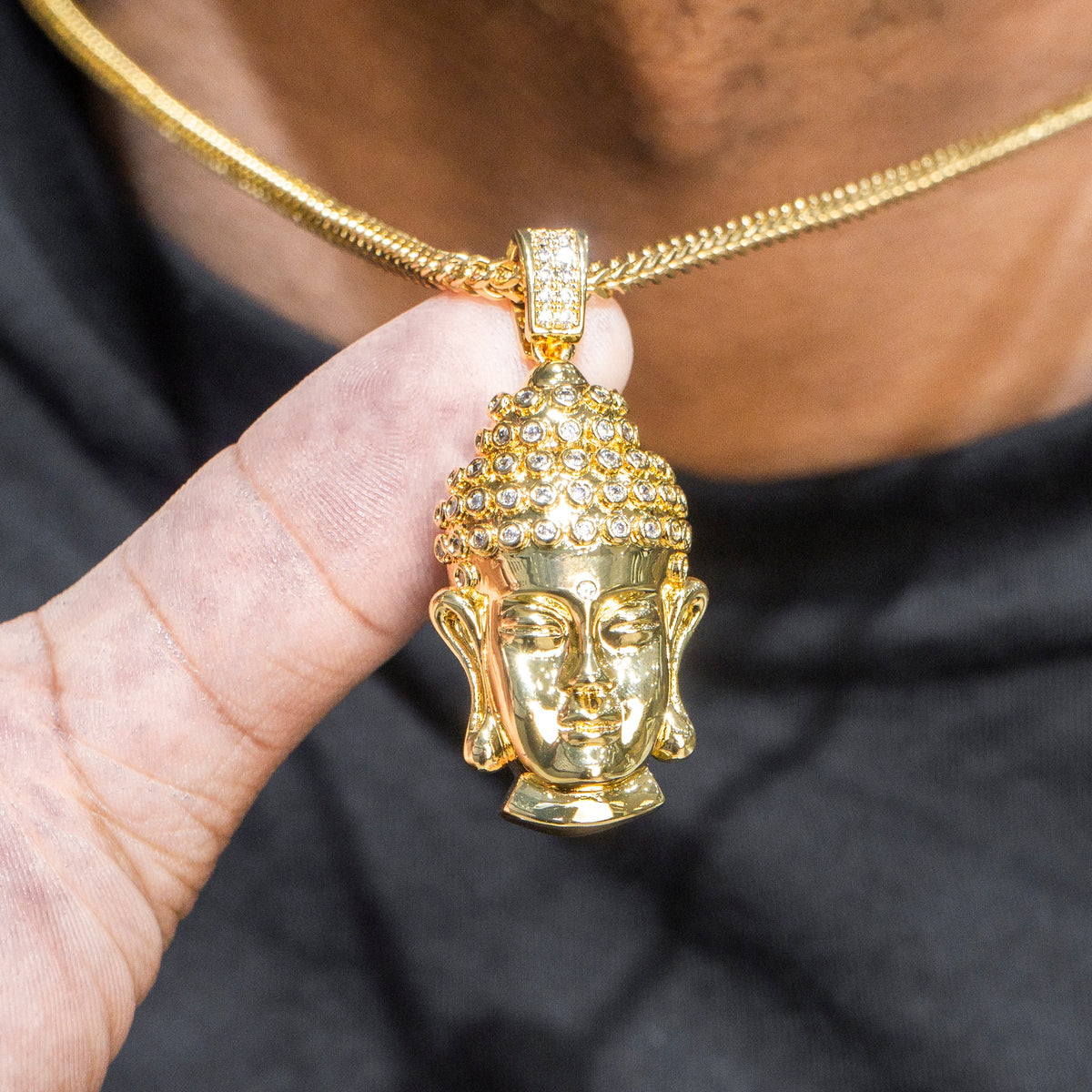 Customer wearing CUBANC jewelry